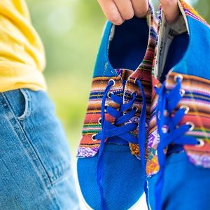 unique bright blue tribal print skater shoes 👁🗺